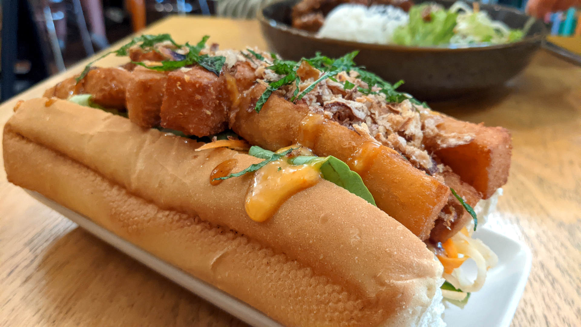 Close up of bahn-mi with crispy tofu